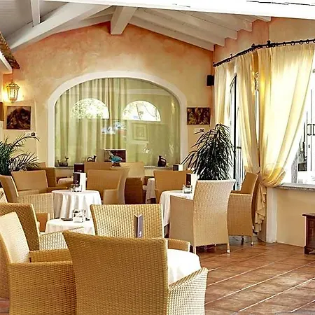 Отель Colonna Country Club Порто-Черво